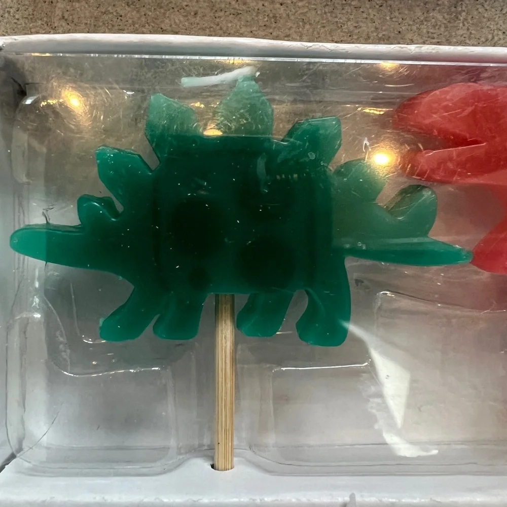 NWT Dinosaur Birthday Candles Set - each set has 4 candles approx 1”x2” each. 🦕